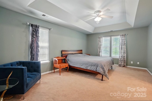 8744 Barrister Way, Charlotte, NC 28216 - bedroom featuring a raised ceiling, carpet, baseboards, and ceiling fan