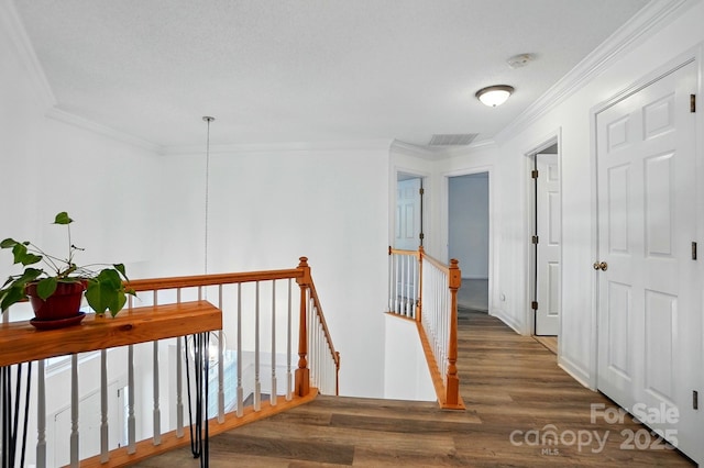 8744 Barrister Way, Charlotte, NC 28216 - hall featuring an upstairs landing, wood finished floors, and ornamental molding