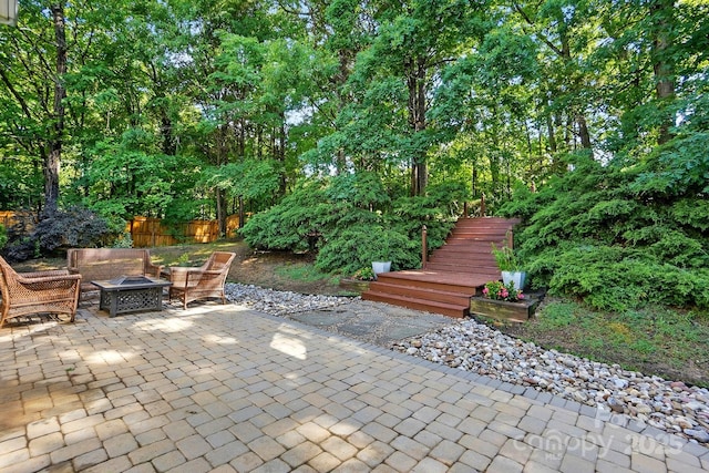8744 Barrister Way, Charlotte, NC 28216 - view of patio / terrace featuring a fire pit and stairs