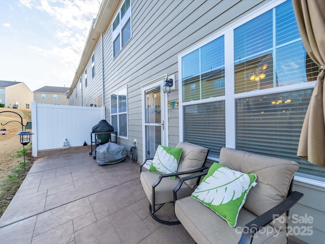 view of patio with fence