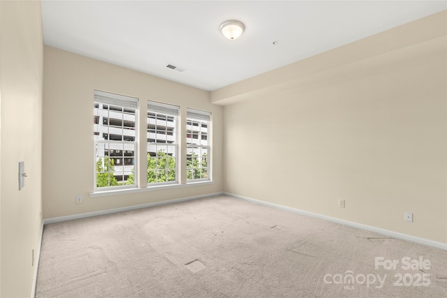 14853 Santa Lucia Dr, Charlotte, NC 28277 - carpeted spare room with baseboards
