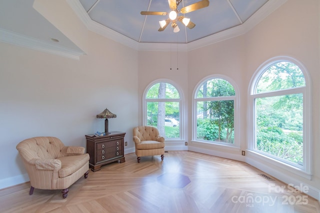 416 E Park Ave, Charlotte, NC 28203 - living area with healthy amount of natural light, a high ceiling, a ceiling fan, and crown molding