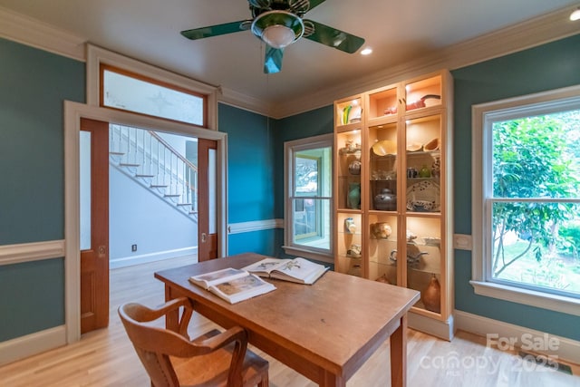 416 E Park Ave, Charlotte, NC 28203 - dining space featuring crown molding, ceiling fan, light wood-style flooring, stairway, and recessed lighting
