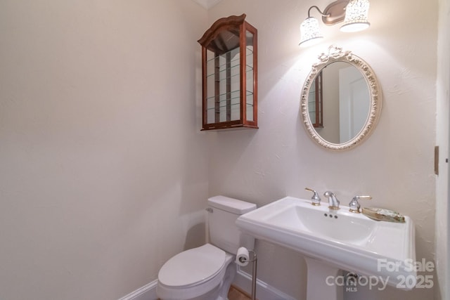 416 E Park Ave, Charlotte, NC 28203 - bathroom featuring toilet and a sink