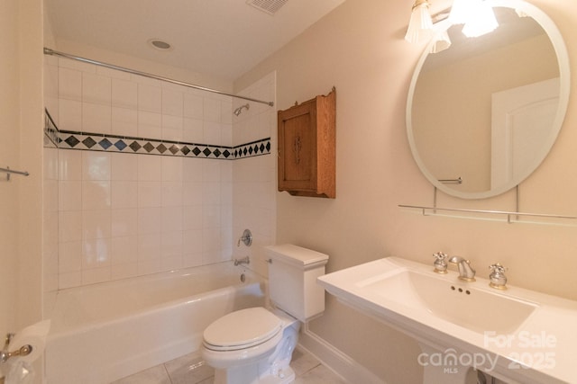 416 E Park Ave, Charlotte, NC 28203 - bathroom featuring tub / shower combination and tile patterned floors