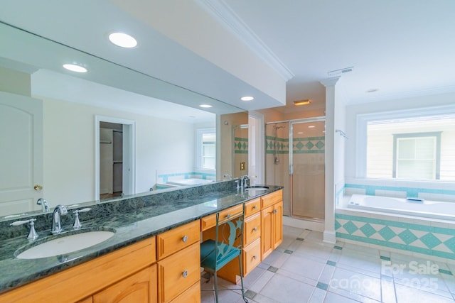 416 E Park Ave, Charlotte, NC 28203 - bathroom with a shower stall, a bath, double vanity, crown molding, and tile patterned flooring