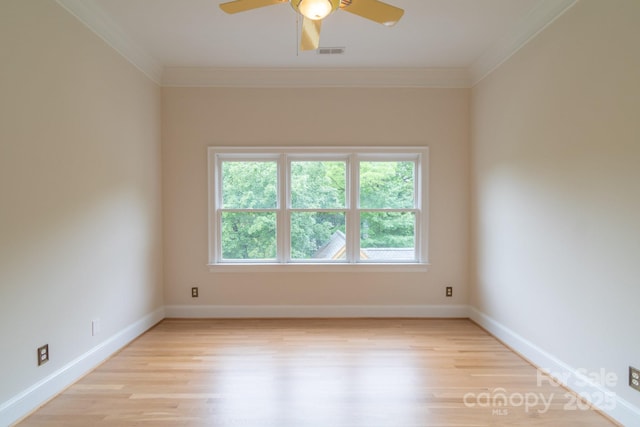 416 E Park Ave, Charlotte, NC 28203 - empty room featuring crown molding, light wood-type flooring, and a ceiling fan