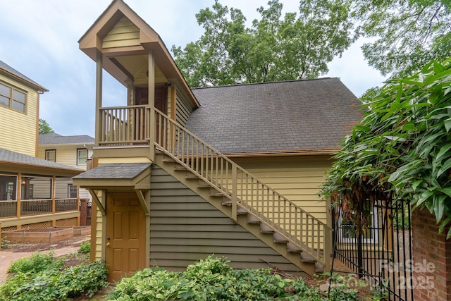 416 E Park Ave, Charlotte, NC 28203 - back of house featuring stairway and a shingled roof