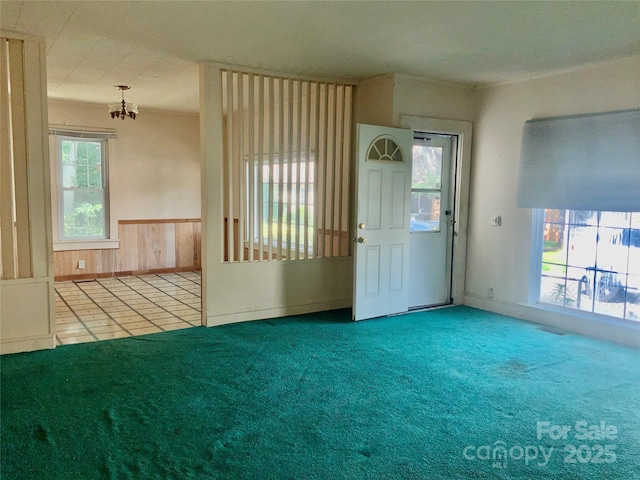 447 17th St, Cramerton, NC 28032 - carpeted foyer with a chandelier