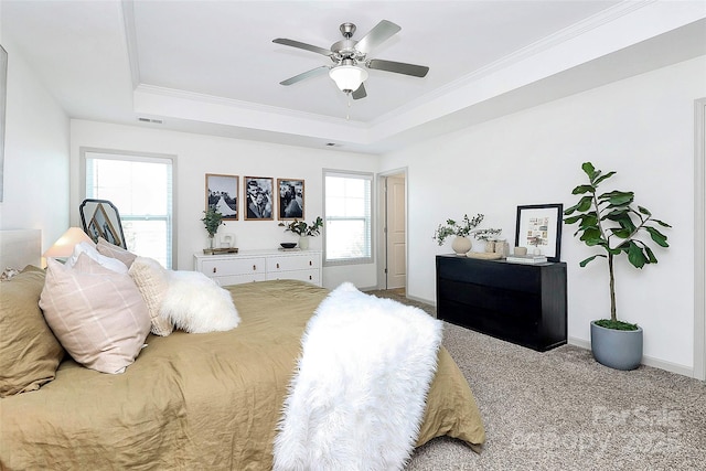 8916 Inverness Bay Rd, Charlotte, NC 28278 - carpeted bedroom with a tray ceiling, crown molding, baseboards, and ceiling fan