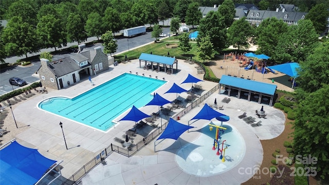8916 Inverness Bay Rd, Charlotte, NC 28278 - community pool with a water play area and a patio