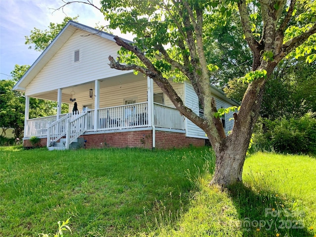 24 Pearl St Unit 8A & 8B, Granite Falls, NC 28630 - view of front of house with a porch and a front yard