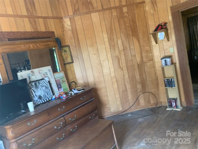 24 Pearl St Unit 8A & 8B, Granite Falls, NC 28630 - bedroom featuring wooden walls and dark wood finished floors