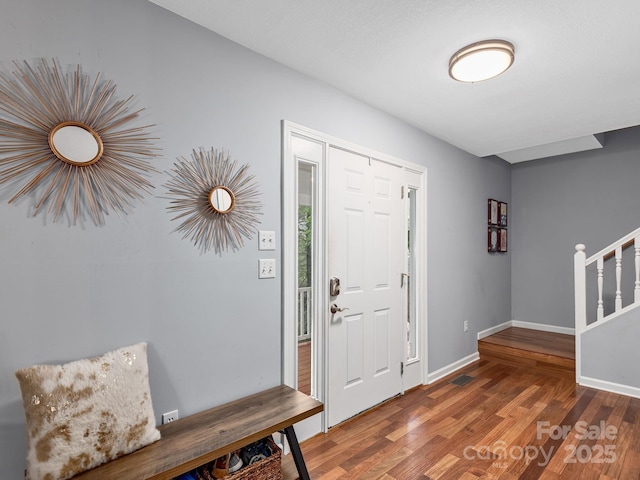 26 Morrow Dr, Fairview, NC 28730 - entrance foyer featuring wood finished floors and baseboards