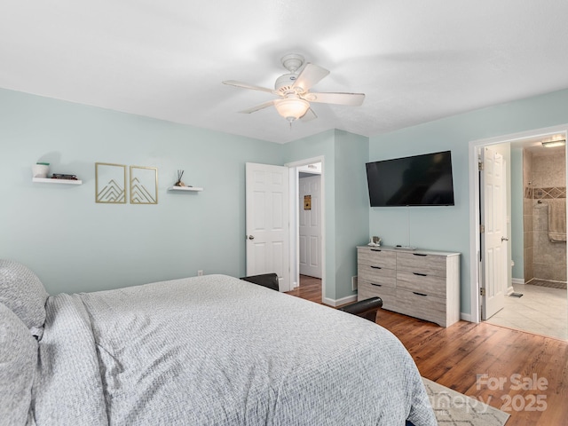 26 Morrow Dr, Fairview, NC 28730 - bedroom with wood finished floors and a ceiling fan