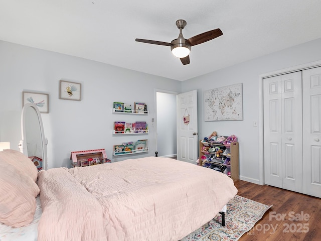 26 Morrow Dr, Fairview, NC 28730 - bedroom featuring a closet, wood finished floors, and a ceiling fan