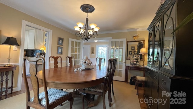 700 Valleyview Dr Unit 1, Albemarle, NC 28001 - dining area featuring a chandelier and crown molding