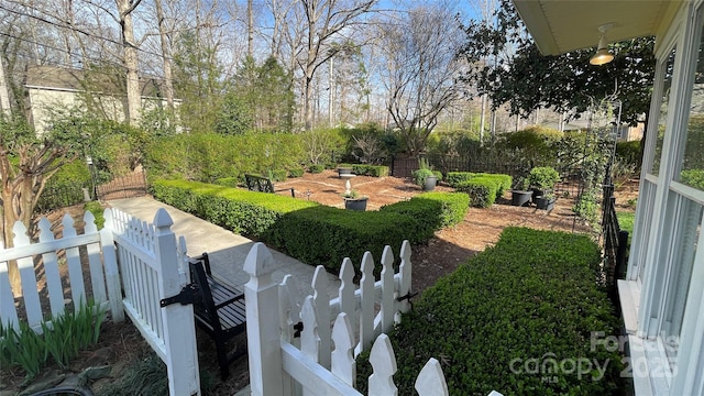 700 Valleyview Dr Unit 1, Albemarle, NC 28001 - fenced yard with a vegetable garden