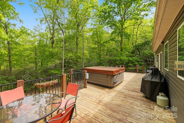 281 Crooked Creek Est, Old Fort, NC 28762 - wooden terrace featuring outdoor dining area, a hot tub, and a forest view