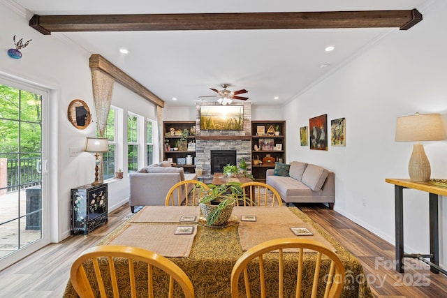 281 Crooked Creek Est, Old Fort, NC 28762 - dining space featuring wood finished floors, recessed lighting, ceiling fan, a fireplace, and baseboards