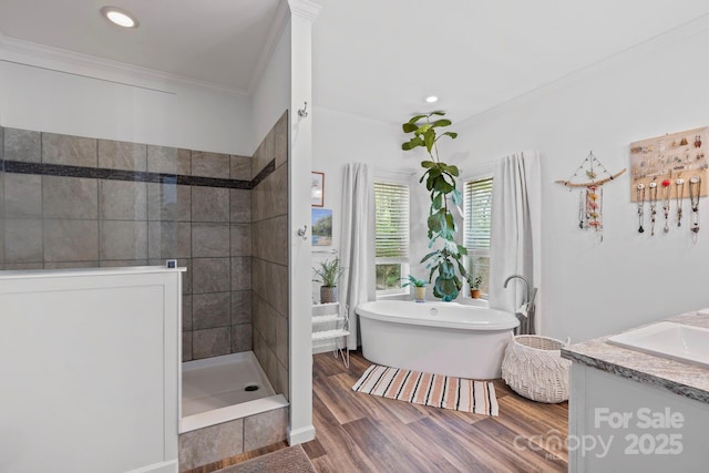 281 Crooked Creek Est, Old Fort, NC 28762 - bathroom with walk in shower, a freestanding bath, ornamental molding, wood finished floors, and recessed lighting