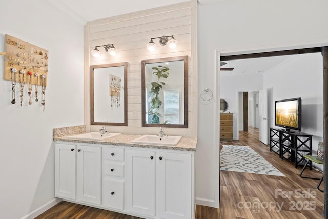 281 Crooked Creek Est, Old Fort, NC 28762 - bathroom with crown molding, wood finished floors, double vanity, and baseboards