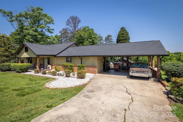 3803 Cook Rd, Valdese, NC 28690 - single story home with a front lawn, an attached carport, concrete driveway, and a shingled roof