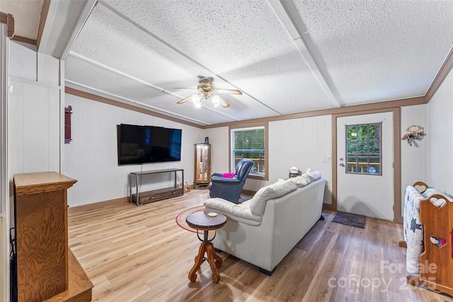 2496 Messer St, Valdese, NC 28690 - living room featuring ceiling fan, wood finished floors, and a textured ceiling