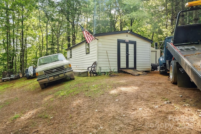 2496 Messer St, Valdese, NC 28690 - view of shed with view of wooded area