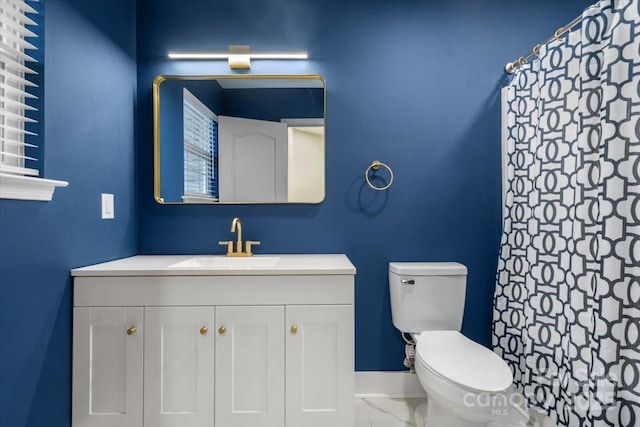 130 Valley Glen Dr, Troutman, NC 28166 - bathroom featuring toilet, vanity, marble look tiles, and a shower with shower curtain