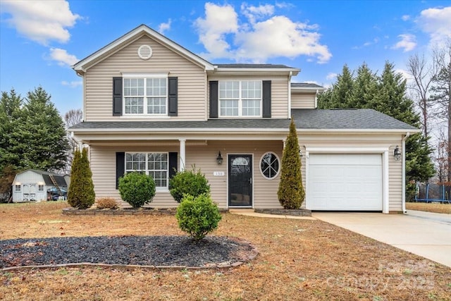 130 Valley Glen Dr, Troutman, NC 28166 - traditional-style home featuring concrete driveway, an attached garage, and a porch