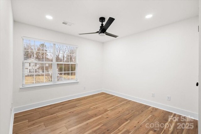 130 Valley Glen Dr, Troutman, NC 28166 - unfurnished room featuring light wood-style flooring, baseboards, ceiling fan, and recessed lighting