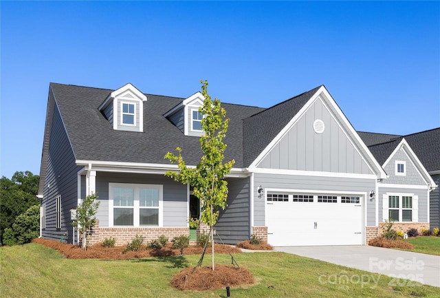 219 Tillery Ln Unit 755, Mount Gilead, NC 27306 - view of front of property featuring brick siding, a front yard, driveway, a garage, and roof with shingles