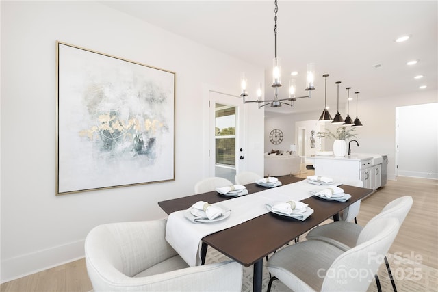 219 Tillery Ln Unit 755, Mount Gilead, NC 27306 - dining room with a chandelier, light wood finished floors, baseboards, and recessed lighting