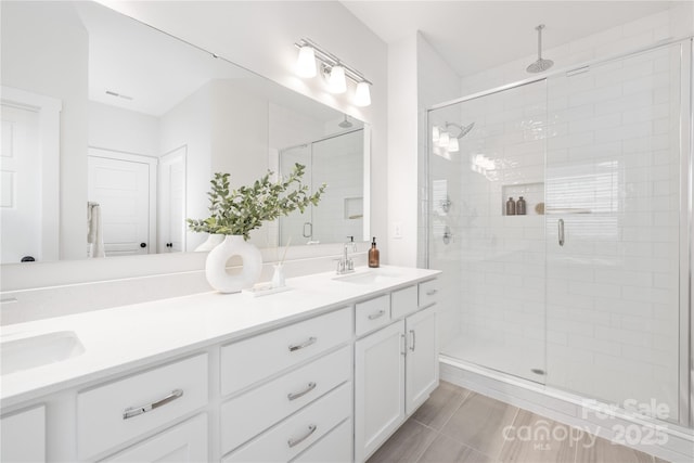 219 Tillery Ln Unit 755, Mount Gilead, NC 27306 - bathroom with double vanity and a shower stall