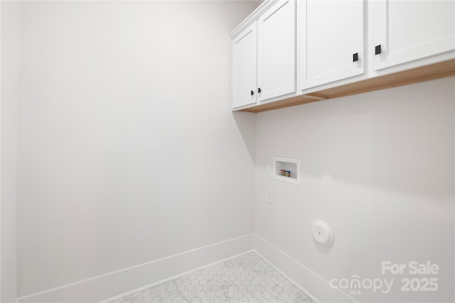 219 Tillery Ln Unit 755, Mount Gilead, NC 27306 - laundry room with cabinet space, baseboards, and washer hookup