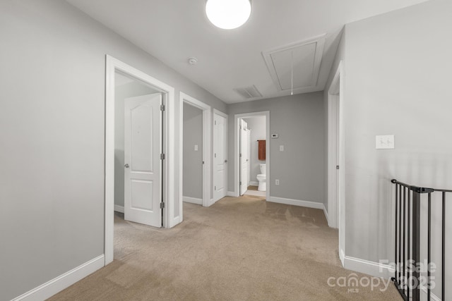 516 King St, Waxhaw, NC 28173 - hall with attic access, light colored carpet, and baseboards