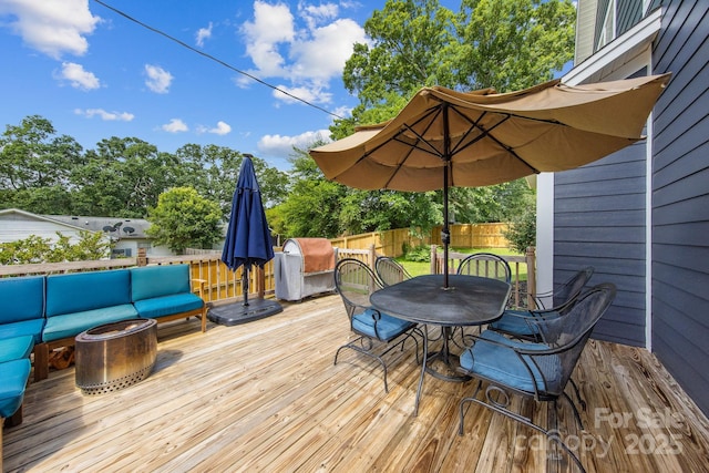 516 King St, Waxhaw, NC 28173 - wooden terrace with outdoor dining area, an outdoor hangout area, and a fenced backyard