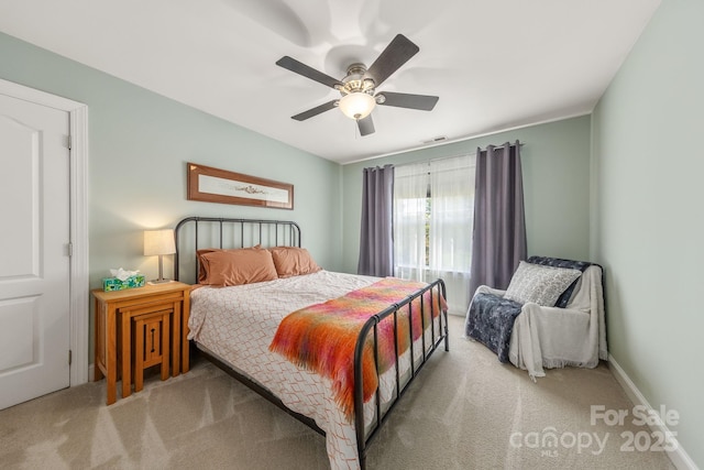 516 King St, Waxhaw, NC 28173 - carpeted bedroom with a ceiling fan and baseboards