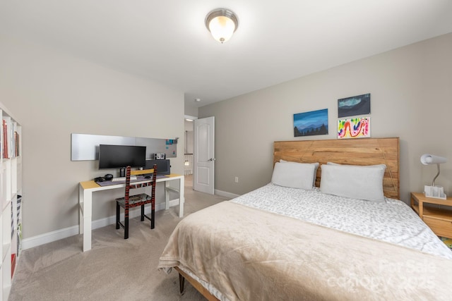 516 King St, Waxhaw, NC 28173 - bedroom featuring light carpet, an office area, and baseboards