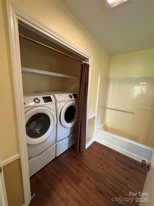 365 Trout Brook Loop, Newland, NC 28657 - washroom with dark wood-style floors and washer and clothes dryer