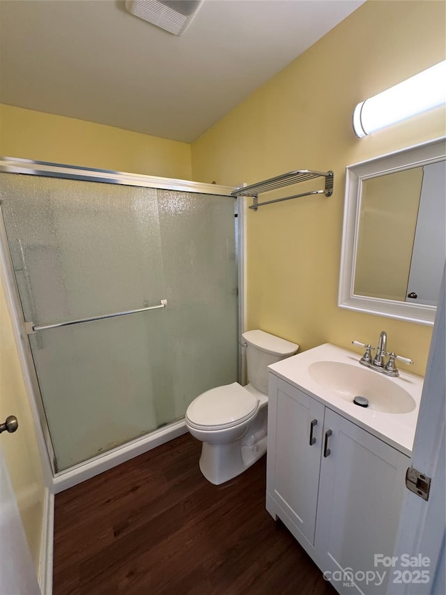 365 Trout Brook Loop, Newland, NC 28657 - full bath featuring wood finished floors, a shower stall, toilet, and vanity