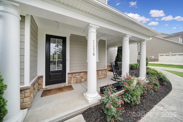 11216 Preservation Ln, Charlotte, NC 28278 - property entrance with covered porch and stone siding