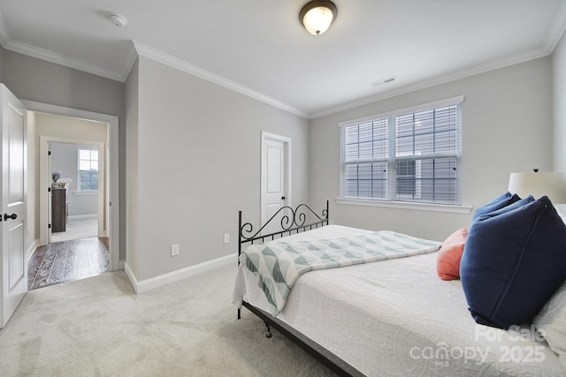11216 Preservation Ln, Charlotte, NC 28278 - bedroom with crown molding and light carpet