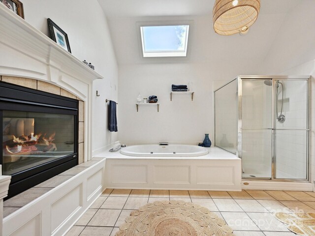 18419 Dembridge Dr, Davidson, NC 28036 - full bath featuring a skylight, a stall shower, a garden tub, tile patterned flooring, and high vaulted ceiling