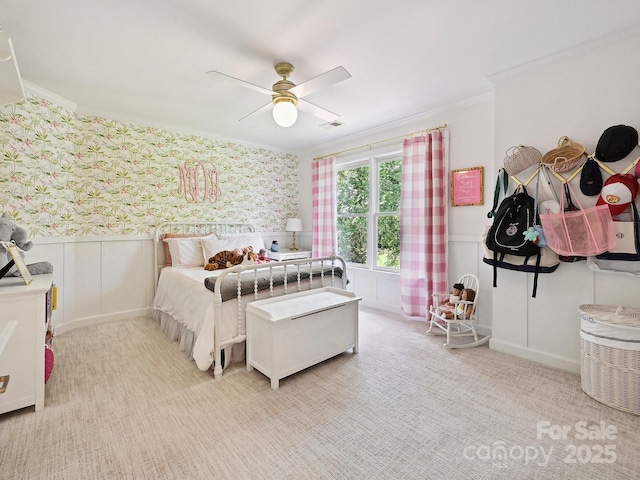 18419 Dembridge Dr, Davidson, NC 28036 - bedroom featuring wallpapered walls, crown molding, wainscoting, carpet flooring, and a decorative wall