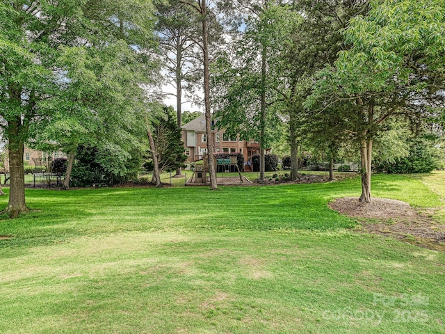 18419 Dembridge Dr, Davidson, NC 28036 - view of green lawn with a deck