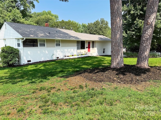 2469 Elkwood Cir, Charlotte, NC 28205 - ranch-style home with a front lawn, a chimney, brick siding, and a shingled roof