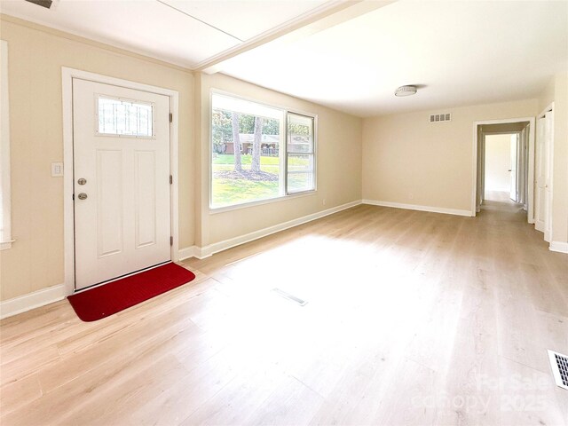 2469 Elkwood Cir, Charlotte, NC 28205 - entrance foyer with light wood-type flooring, plenty of natural light, and baseboards