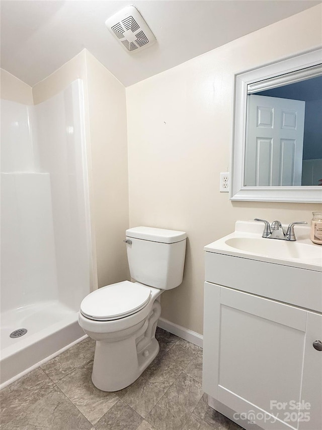 2469 Elkwood Cir, Charlotte, NC 28205 - bathroom featuring vanity, toilet, baseboards, and a shower